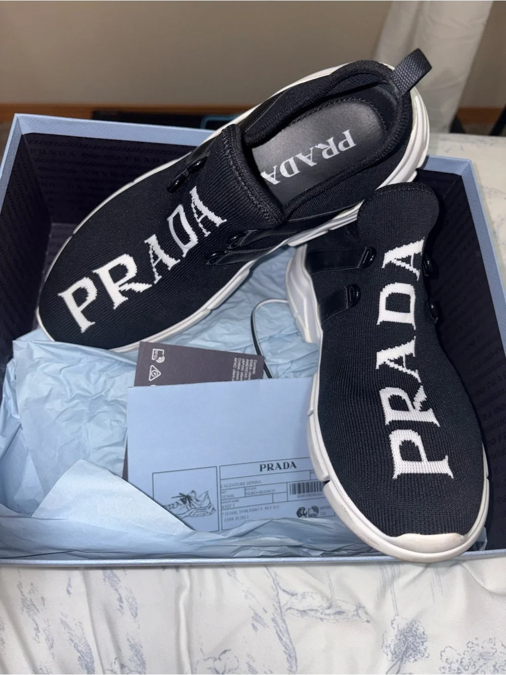 Prada womens Black Logo Knit Slip-On Sneakers